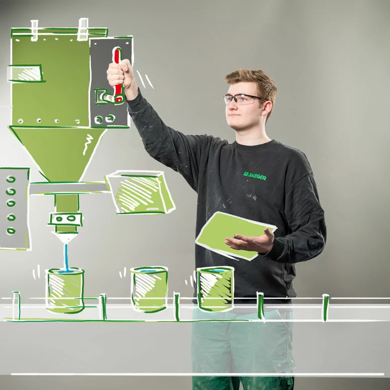 Auszubildender zum Chemikant steht an einer Abfüllanlage